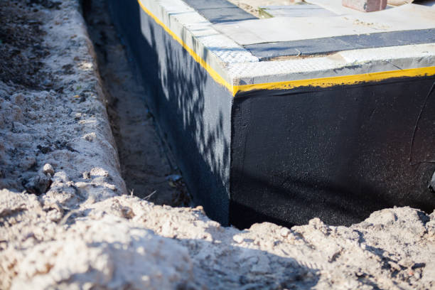 Professional Waterproofing technician working in North Royalton, OH